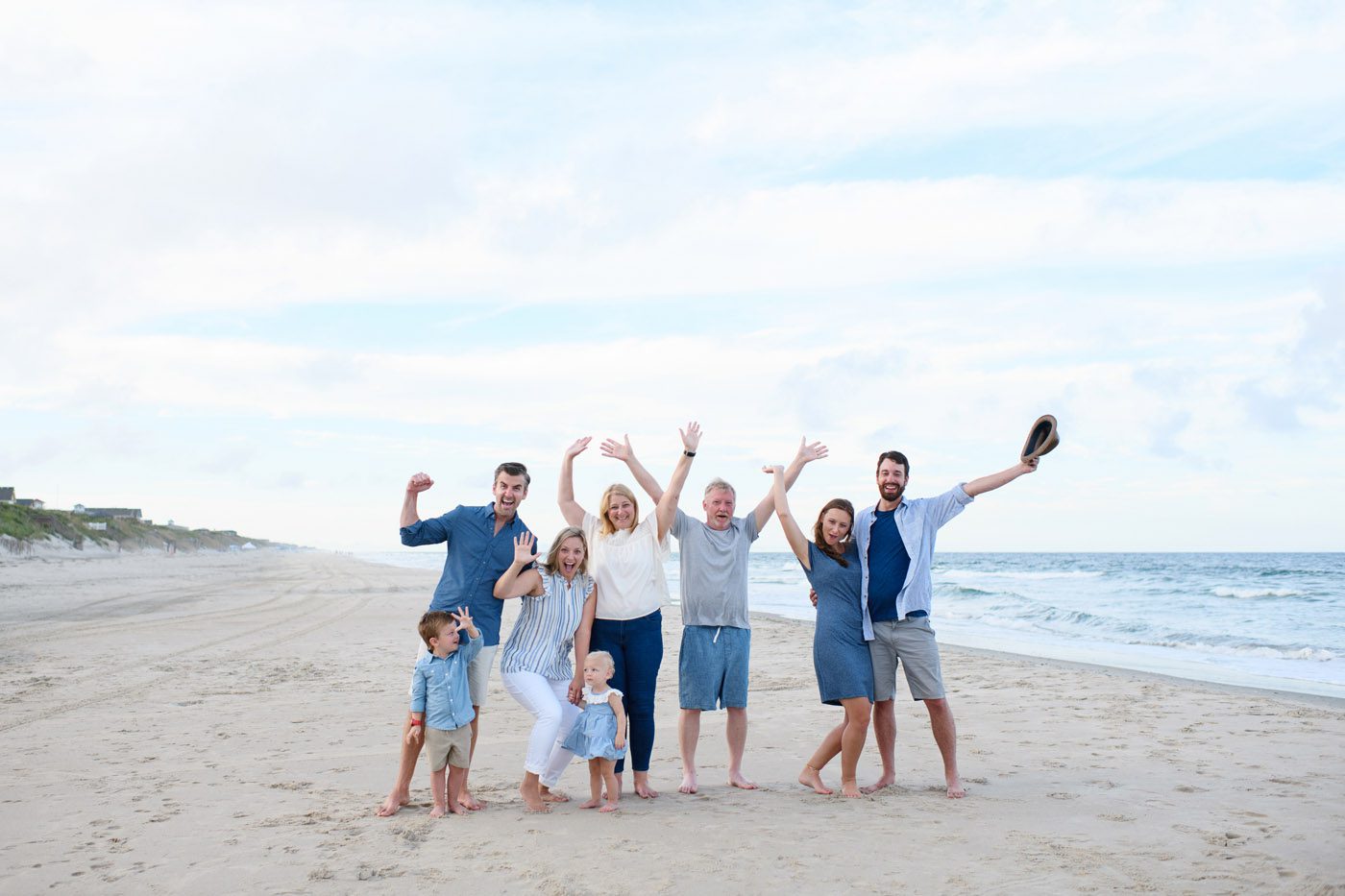 Family having fun during a portrait session in Corolla