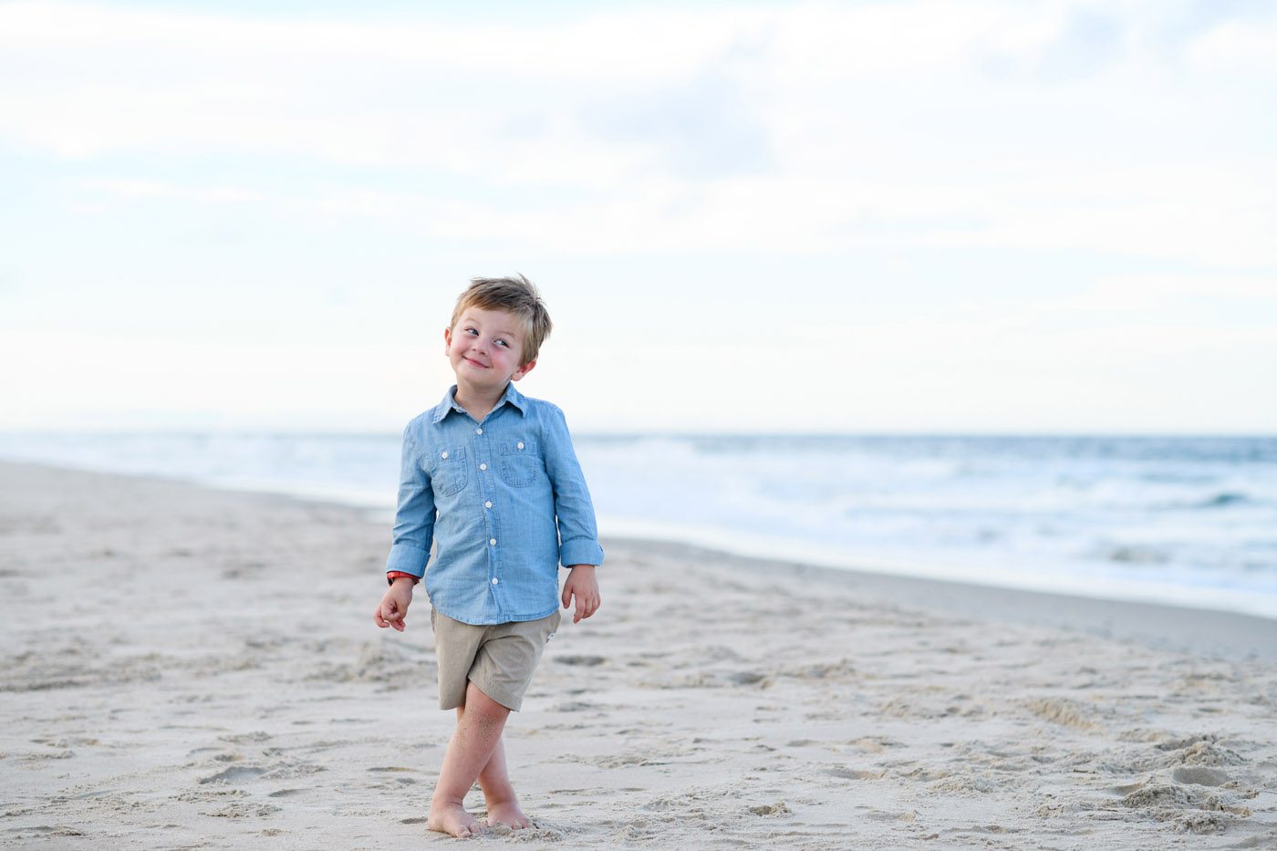 Fun Outer Banks family portraits featuring kids on the beach